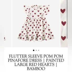 FLUTTER SLEEVE POM POM PINAFORE DRESS | PAINTED LARGE RED HEARTS | BAMBOO